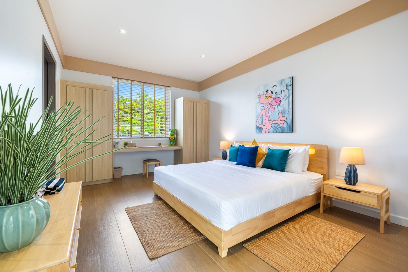 Bright double bedroom with workspace and garden view at Villa Sue, Koh Samui